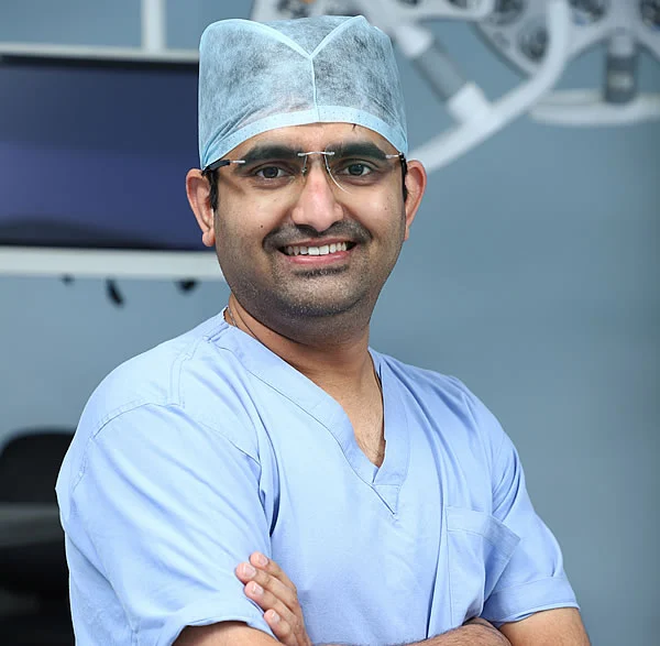 Dr Mohan Venkatesh Pulle in surgical scrubs